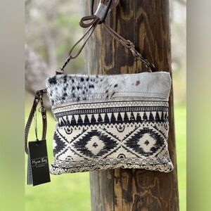 Myra Bag leather and cowhide  fur details medium size